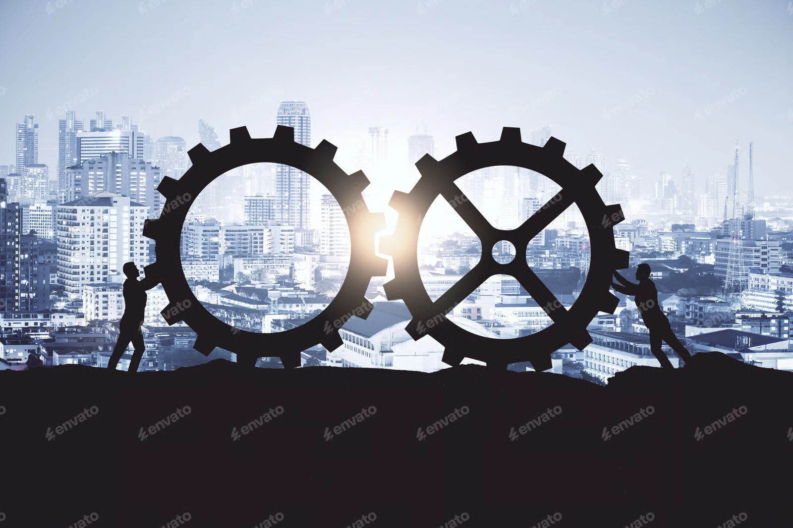 two-businessmen-push-big-cogs-on-a-night-city-back-QLS6RGV